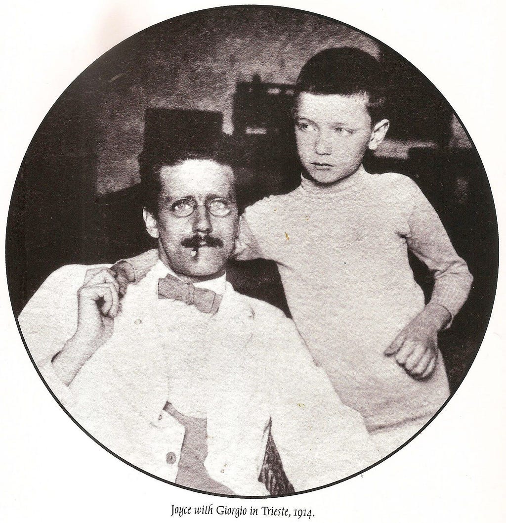 Photograph of James Joyce with his son.