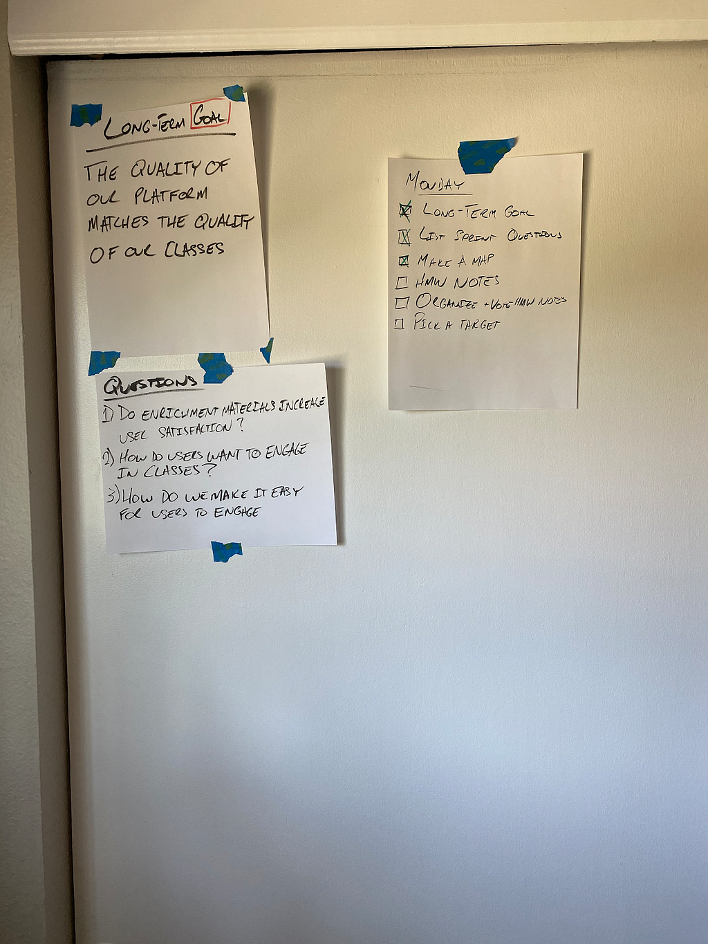A picture of my “whiteboard” by EOD Monday. It includes the questions mentioned, the longterm goal, and a checklist