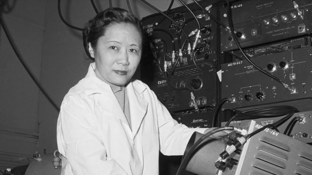 A black and white photo of Chien-Shiung Wu working on the manhattan project.