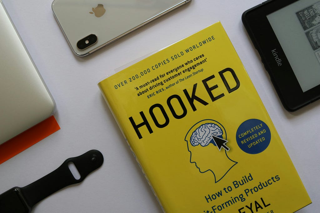 Yellow book with “HOOKED” as a title