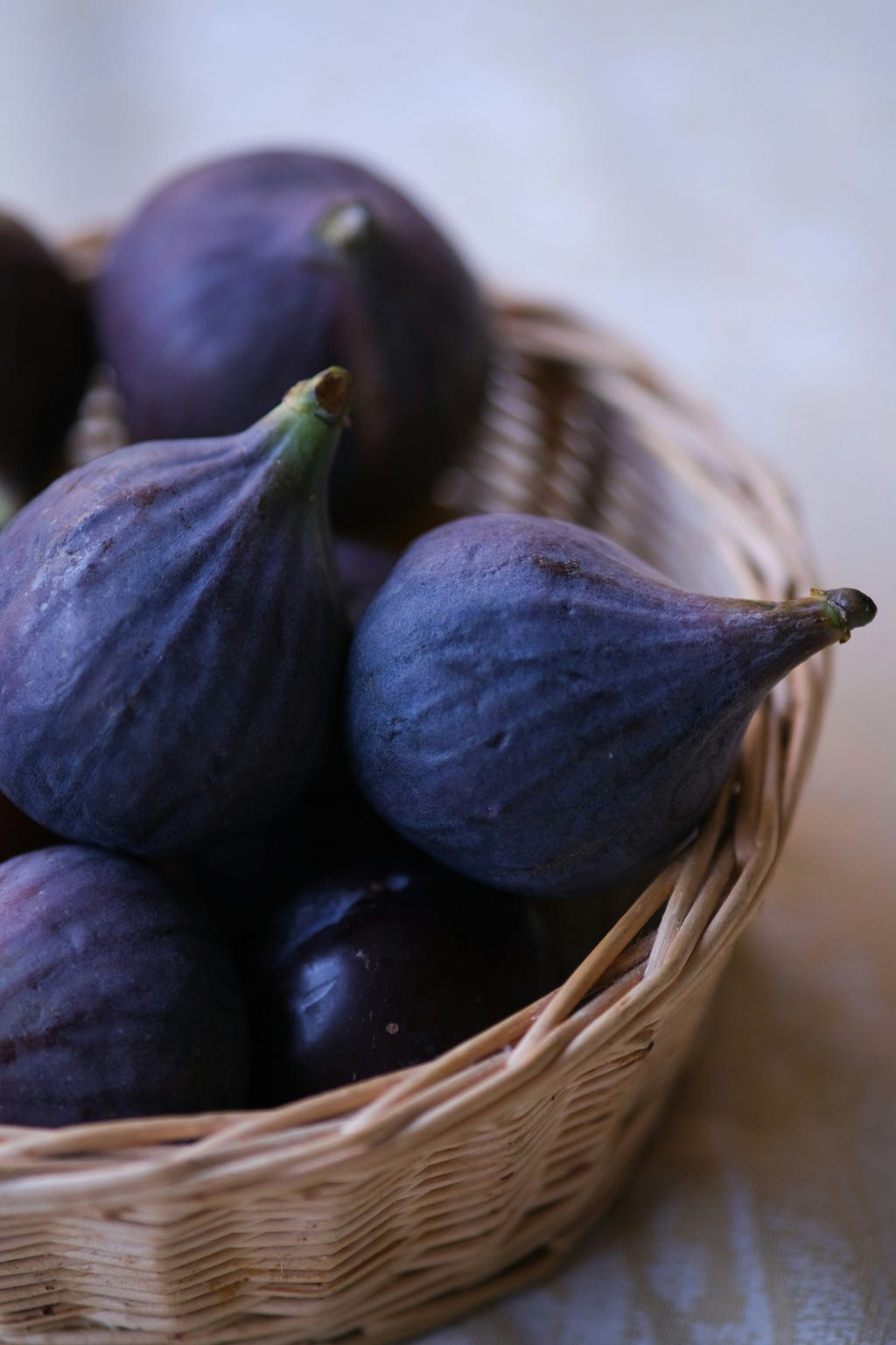 Image of ripe, black figs. The best kind, because their insides are red and luscious — with a strong flavour.