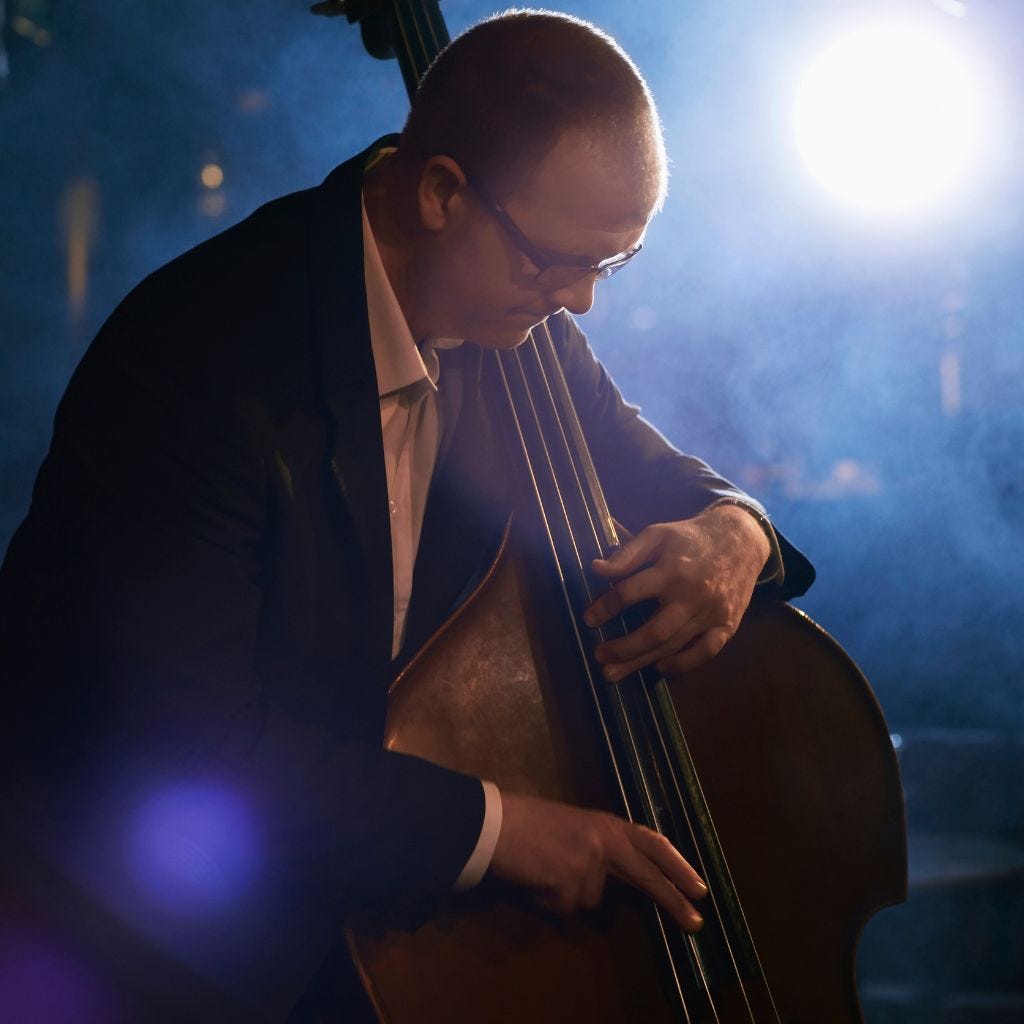 man playing a double bass