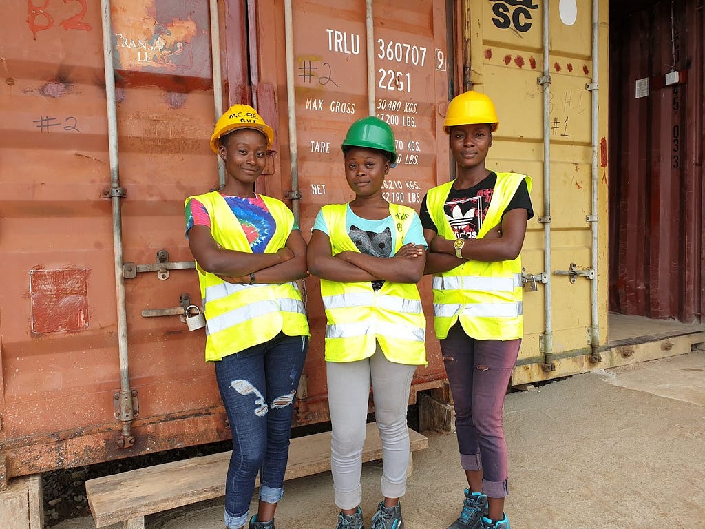 Hawa Baryoh (left), Florence Saffea (center), and Jenneh Abu (right) are just 3 of the women who make up the BHI MCOE construction team. As of November 1st, 2022, the MCOE construction team has equal numbers of male and female staff.