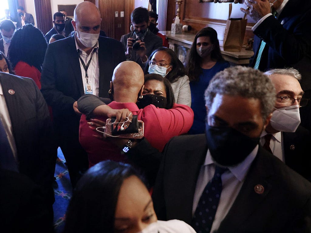 Rep. Cori Bush embraces Rep. Ayanna Pressley as members of the Congressional Black Caucus react to the verdict in the Chauvin trial.