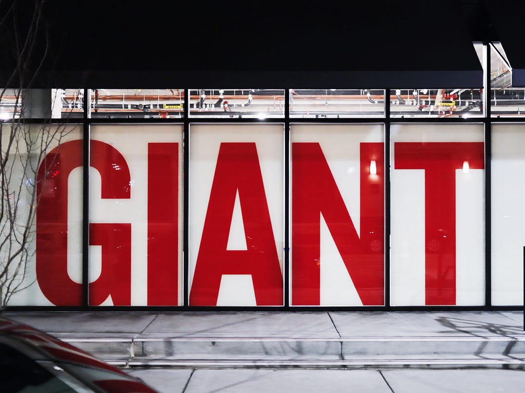 A wall that has painted in word “Giant”.