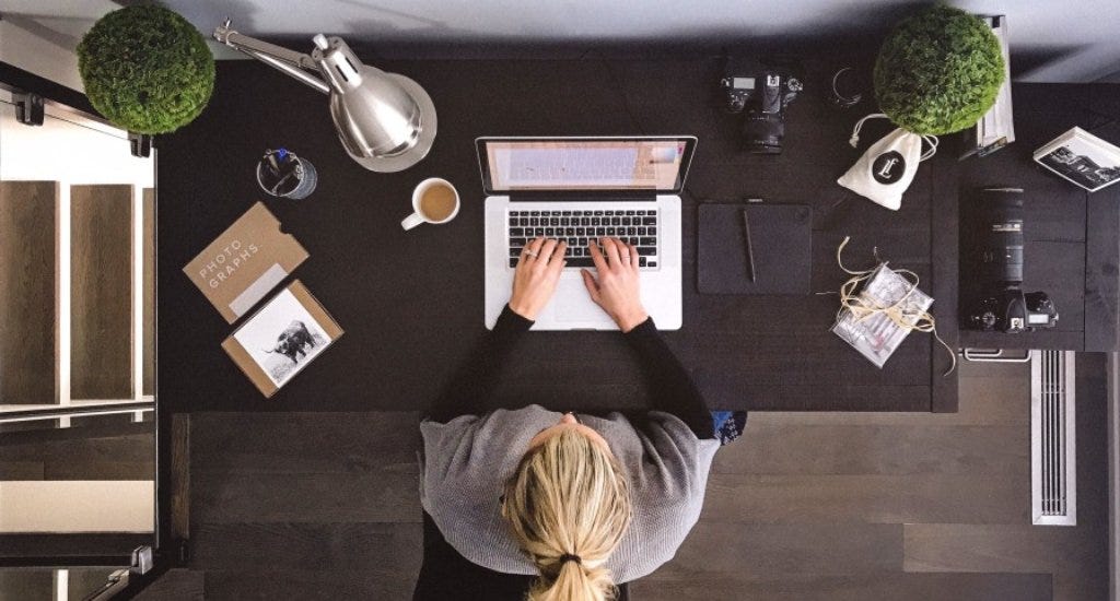 An overhead shot of an entrepreneur hustling