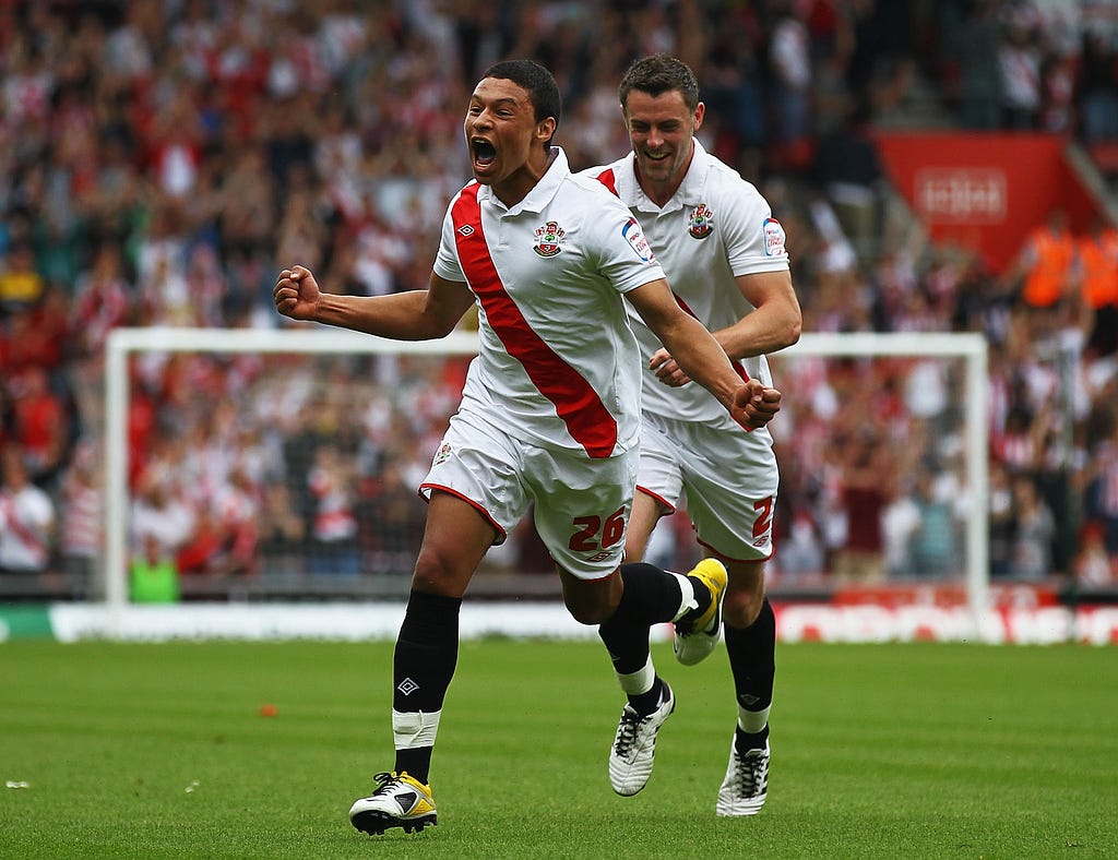 Alex celebrates a goal as Southampton secure promotion from League 1 in 2011