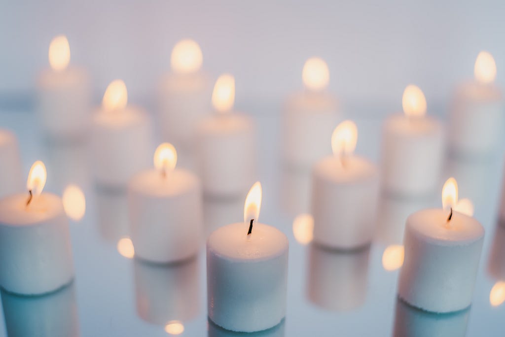 Inexpensive candles can often be found in the craft department.