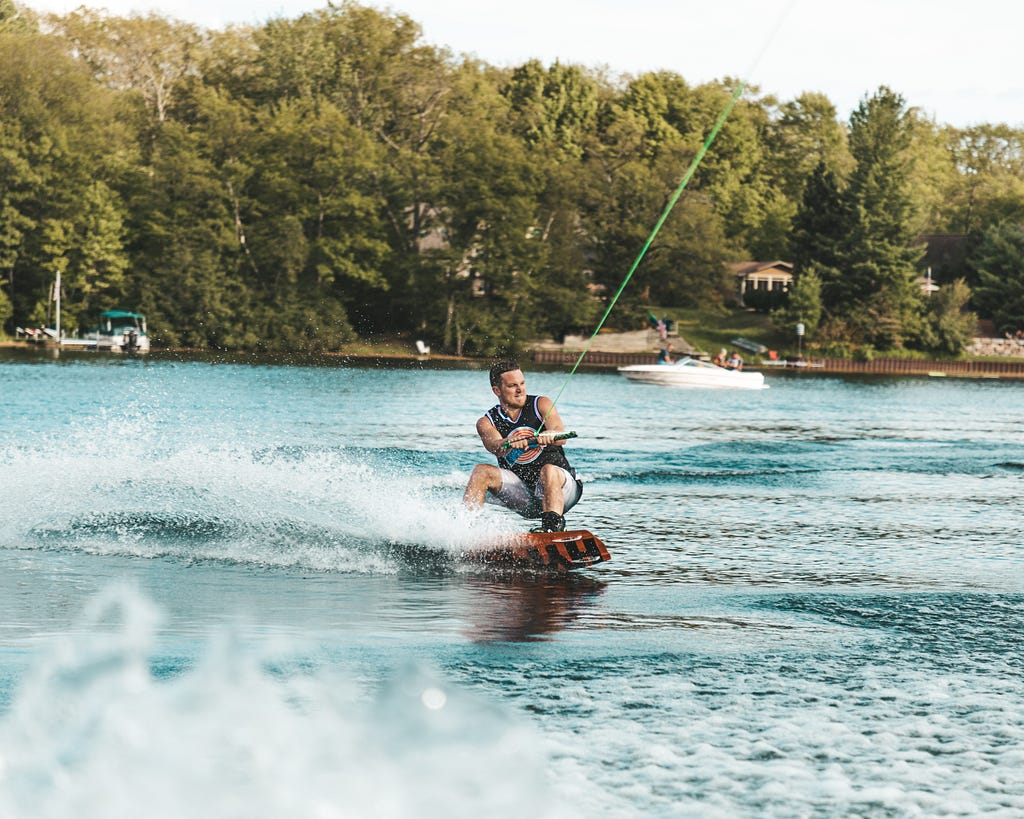 A guy doing wakeboard