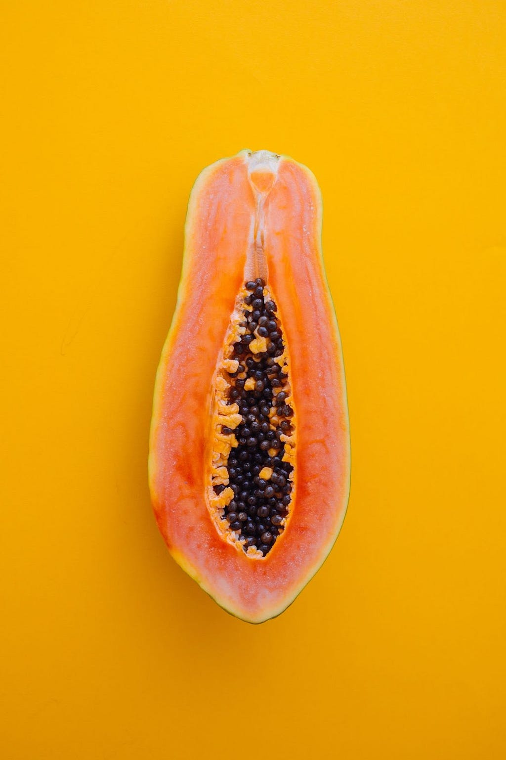 Longitudinal cut papaya.