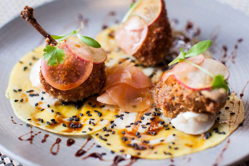 Spiced quail legs with mango radish lychee soya caramel and crème fraiche (Photo: Fade Social)