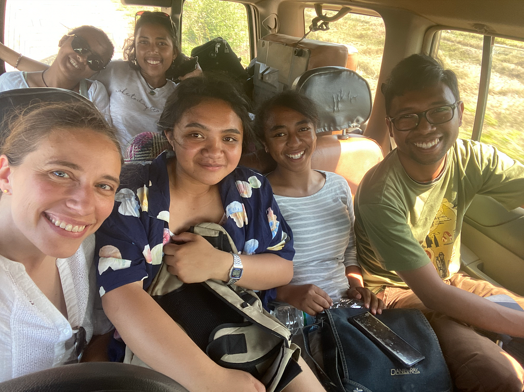 Stephie (third from left) on the road for return of results in Madagascar with other members of the research team.