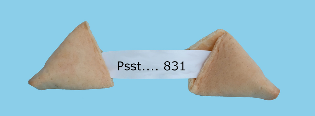 A fortune cookie, with the test inside reading “pst… 831”