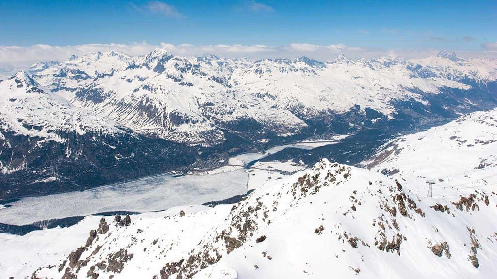 Discover the Magic of Corvatsch in the Engadine: Skiing, Cable Car Rides, Walking Trails, and More