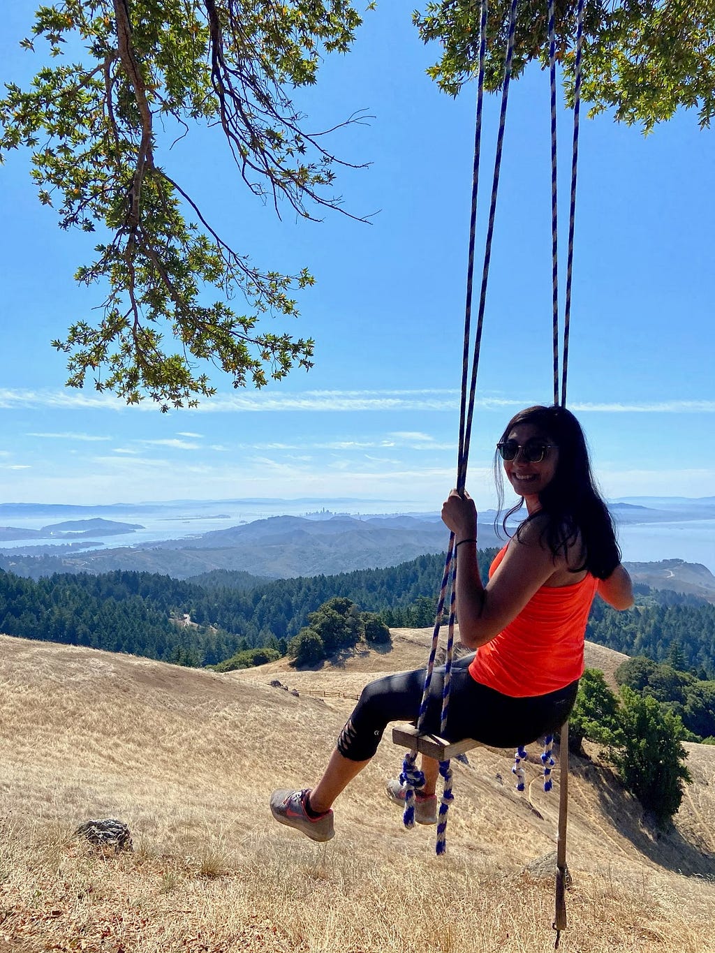 Harshita sits on a swing at the top of Mt. Tamalpais, overlooking the Bay Area.
