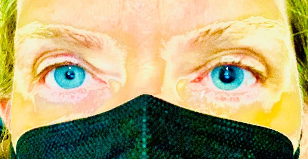 Image of authors eyes with many filters showing one eye dialated.