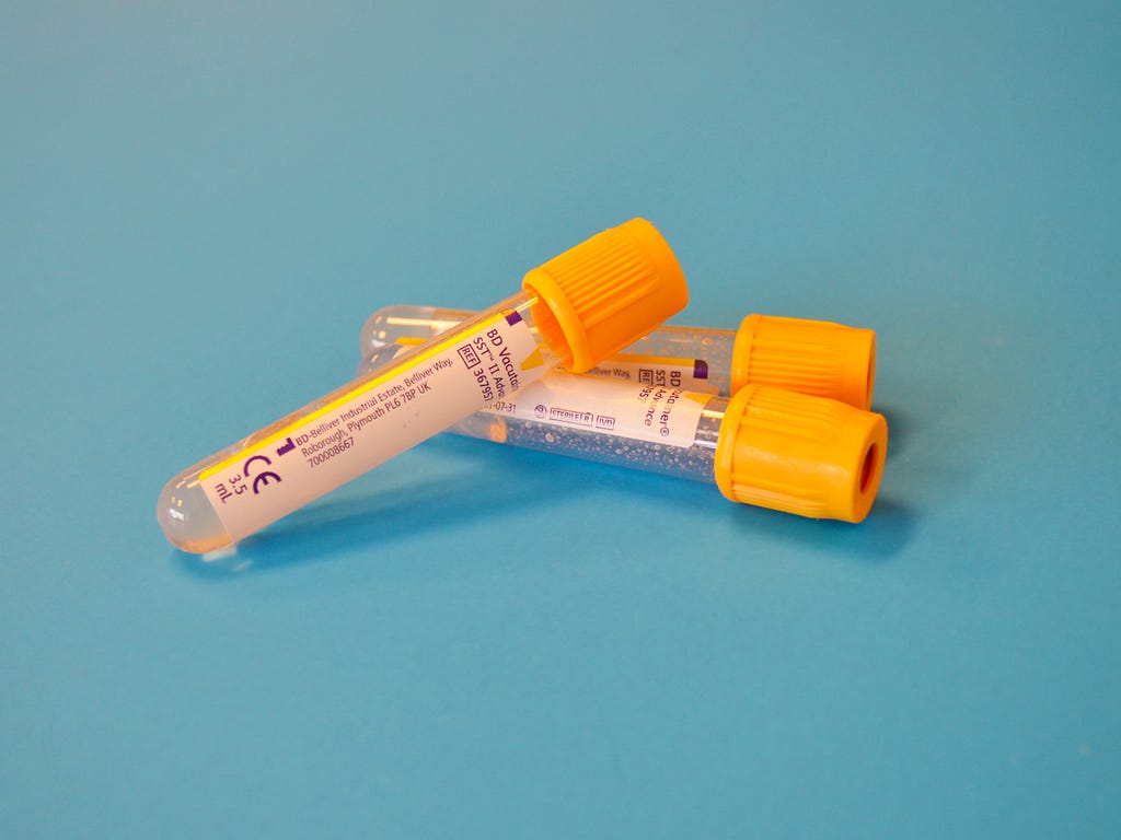 Some empty blood sample vials