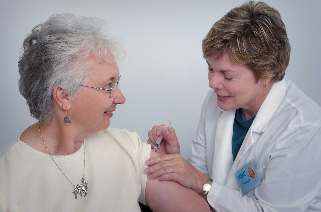 Woman getting a vaccine shot