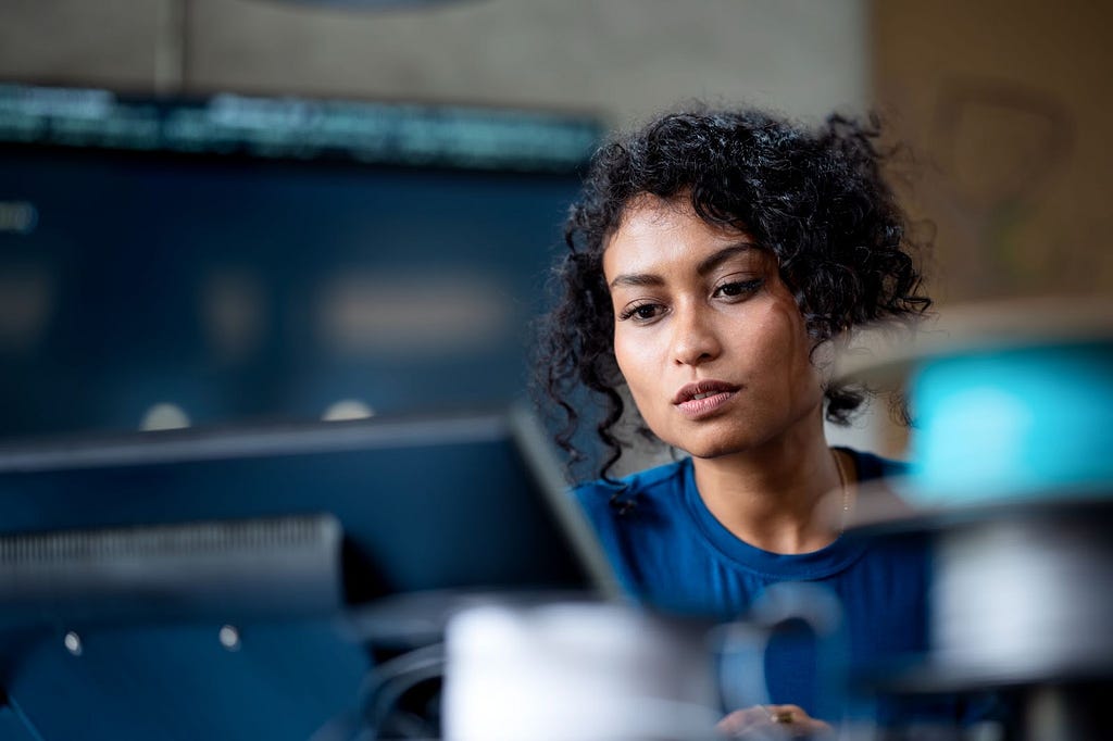 Female scientist evaluates genetic information