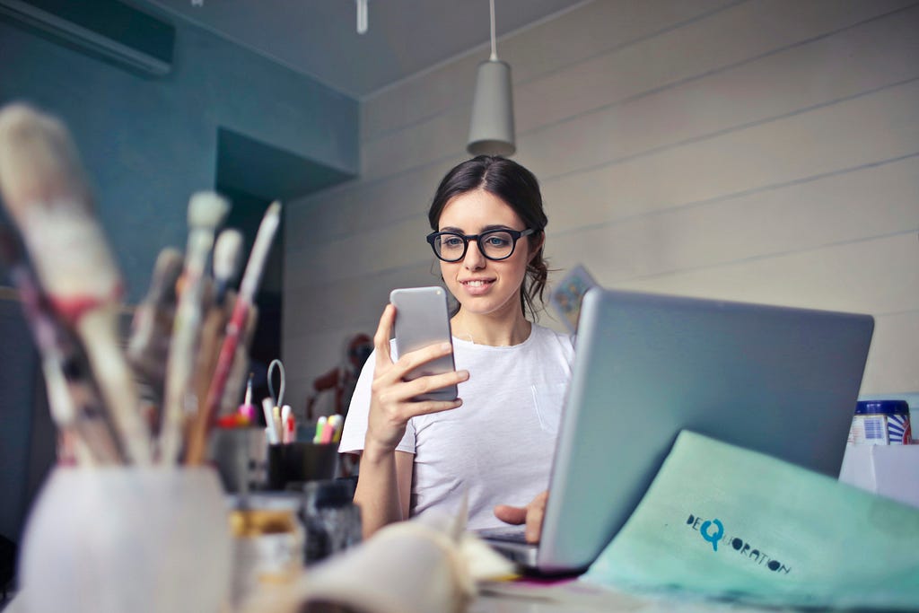 A female content creator making a post for Instagram