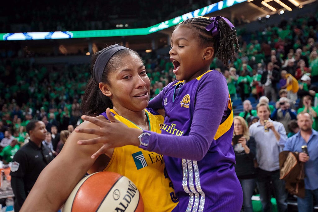 Candace Parker shares a moment with daughter, Lailaa, after the Sparks won the 2016 WNBA Championship