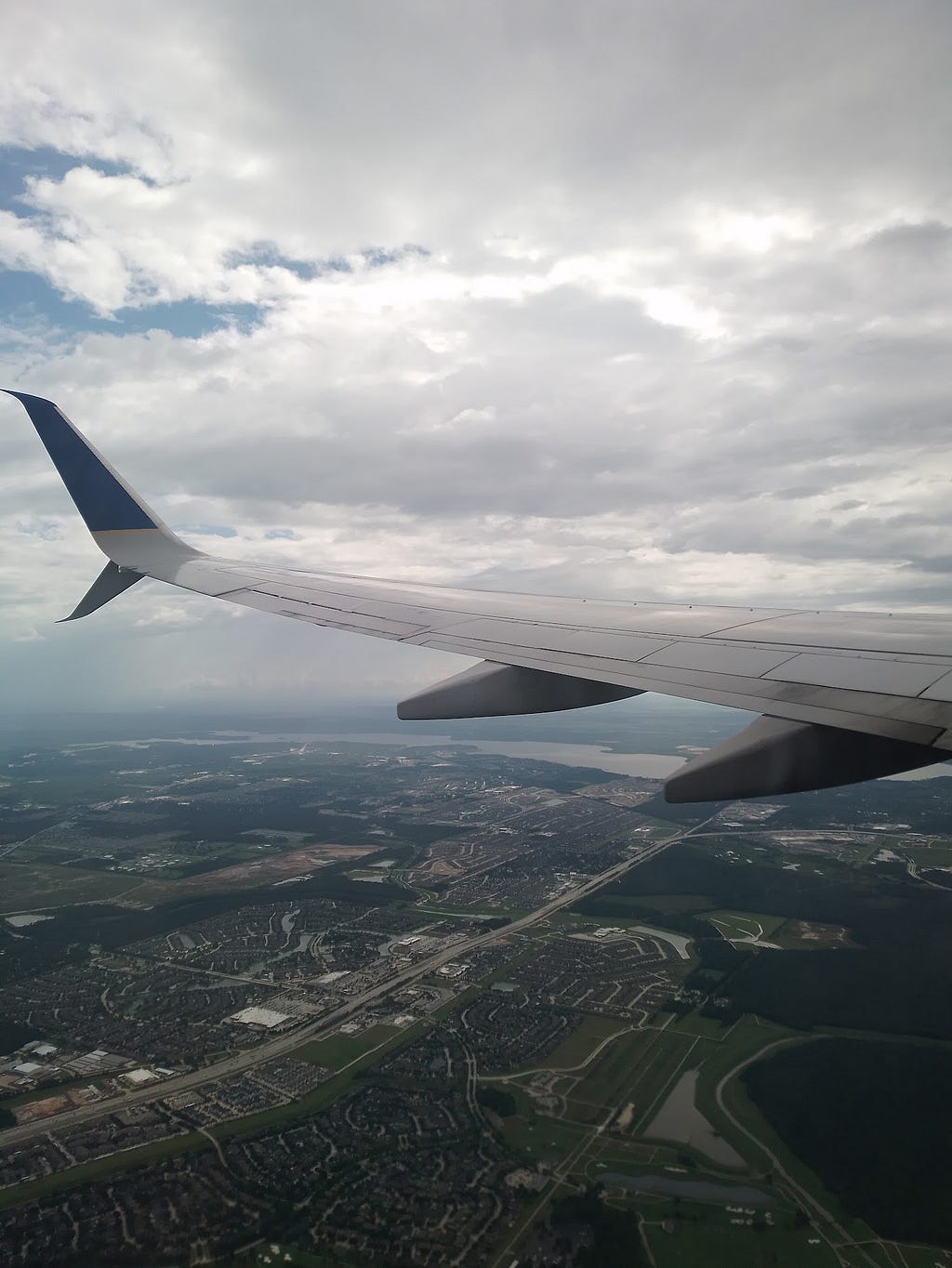 Wing shot, featuring Houston, Texas below — from the flight I almost missed