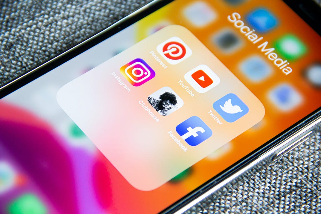Icons of different social media apps on the phone screen