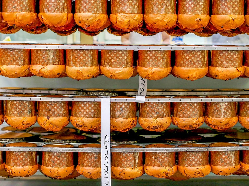 Panettone cakes are seen on a rack at the Pasticceria Giotto in Padua’s Due Palazzi prison in 2014.