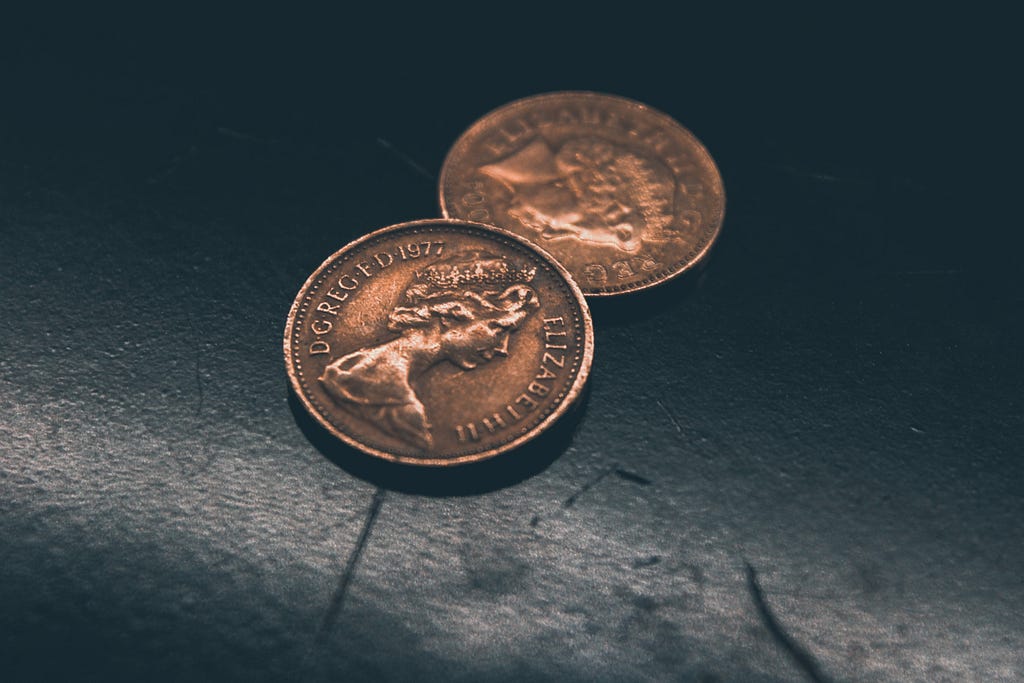 A photo of two copper coins