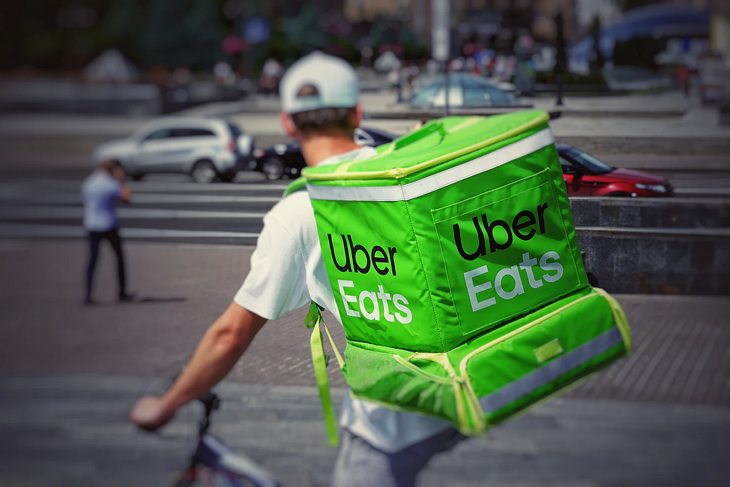 A driver from Uber Eats doing an on-demand delivery