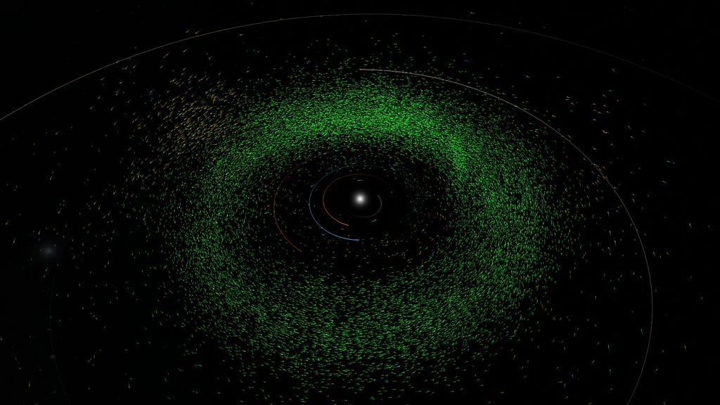 Each green dot is one of the 27,500 asteroids just discovered by AI in our solar system. Image by: B612 Asteroid Institute / University of Washington DiRAC Institute / OpenSpace Project