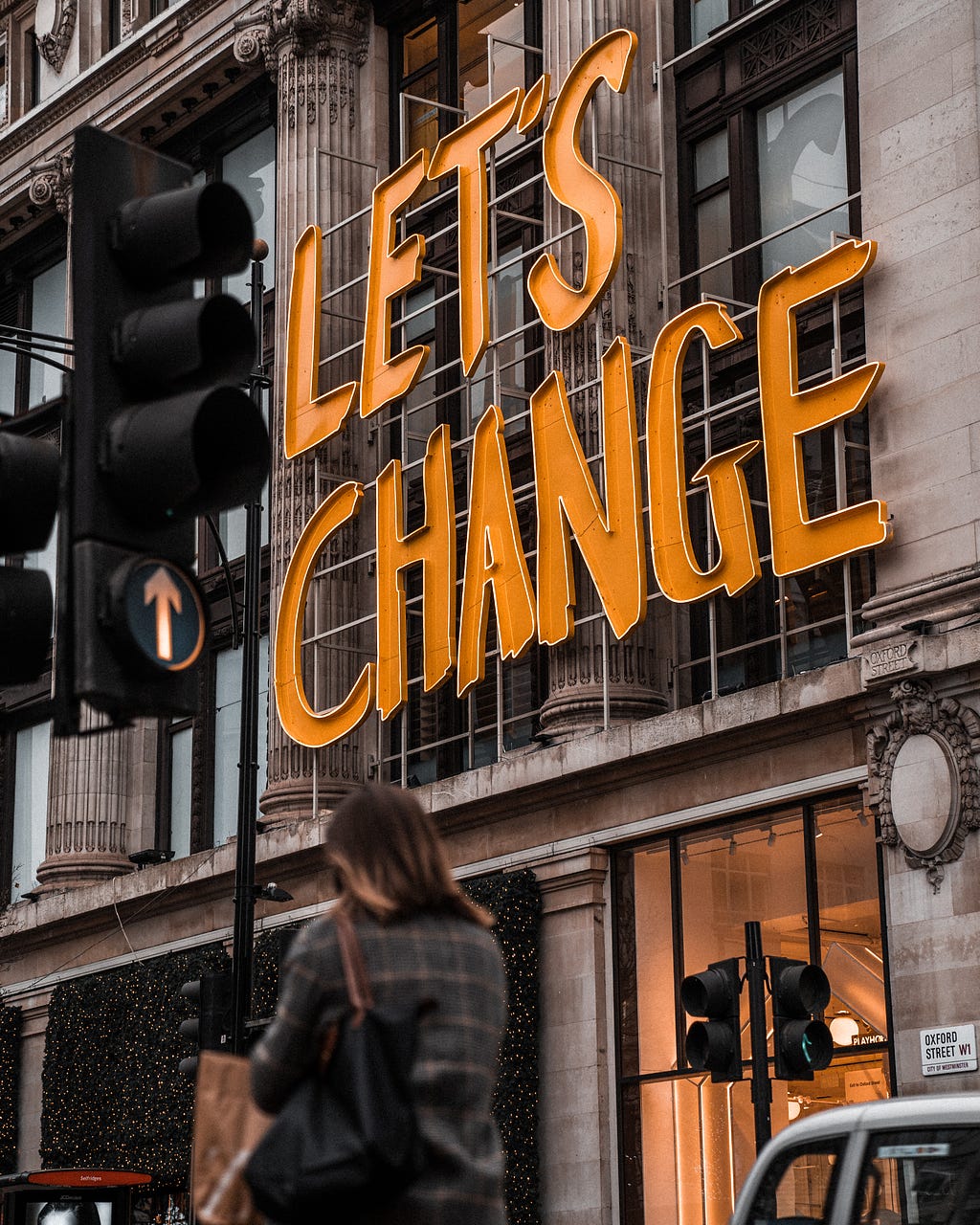 “Let’s Change” sign on a building