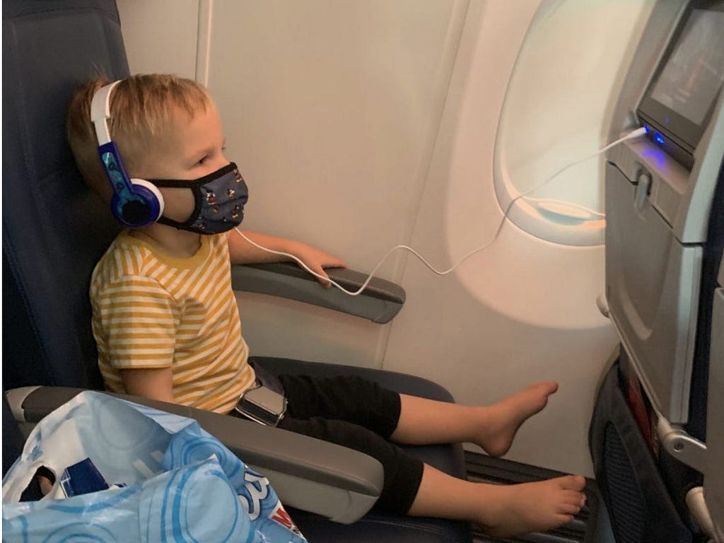 The author’s son watched Delta’s in-flight entertainment on the flight to Orlando, Florida.