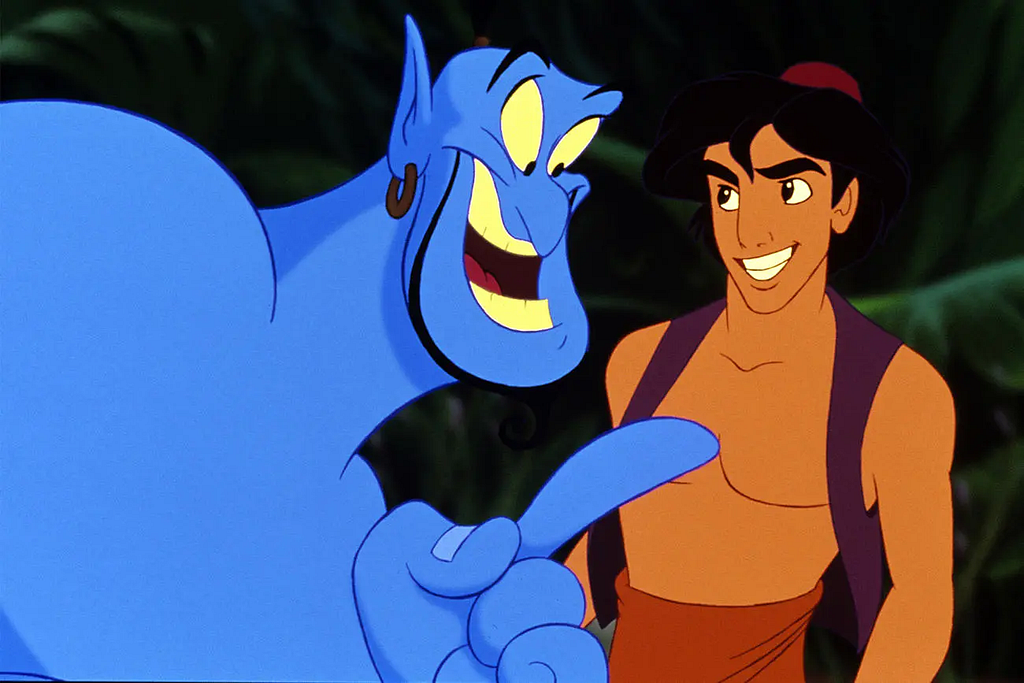 Cena do filme Aladdin, em que o Gênio da Lâmpada, um ser humanizado azul com orelhas pontudas, barba, brinco e mãos grandes, conversa com Aladdin, que está sem camisa, usando um colete, uma calça cintura alta e um chapéu chamado fez.