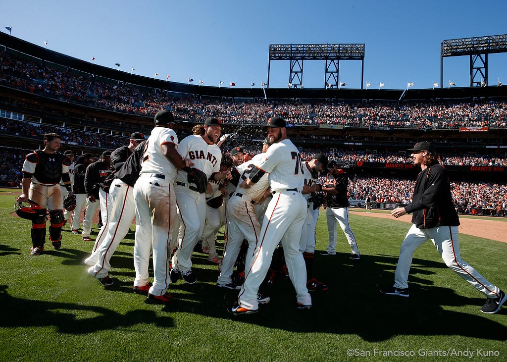 The team celebrates after the final out of the ninth inning.