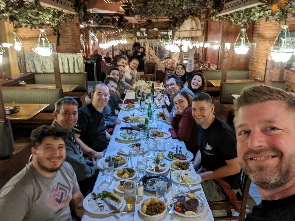 Kubeshop team at a dinner celebration