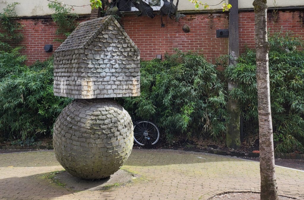 house on a sphere scultpture