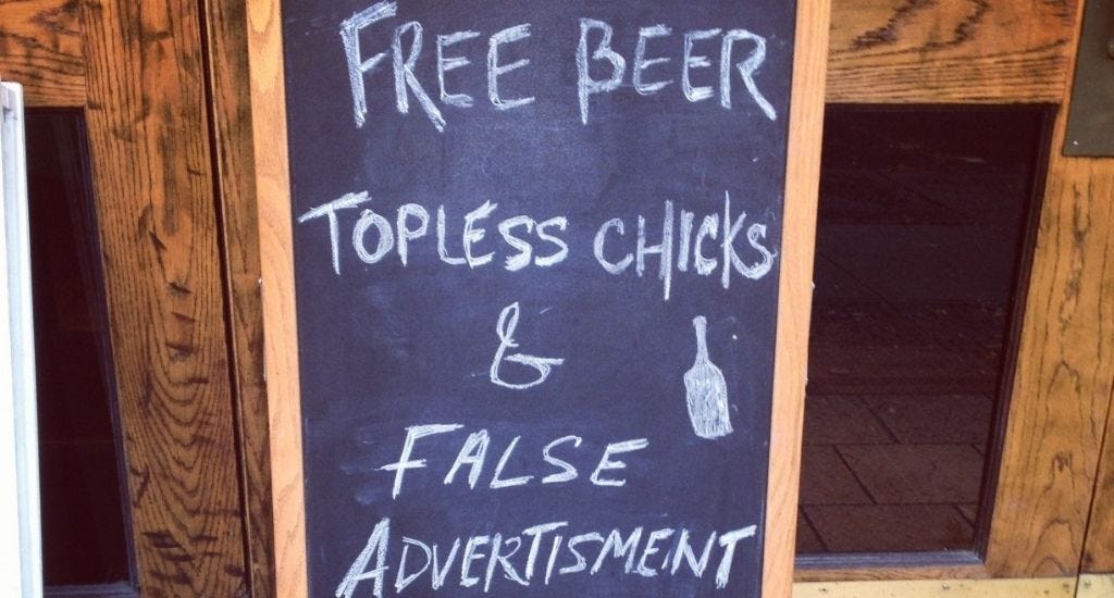 Sign outside of bar that reads "Free beer, topless chicks, and false advertising"