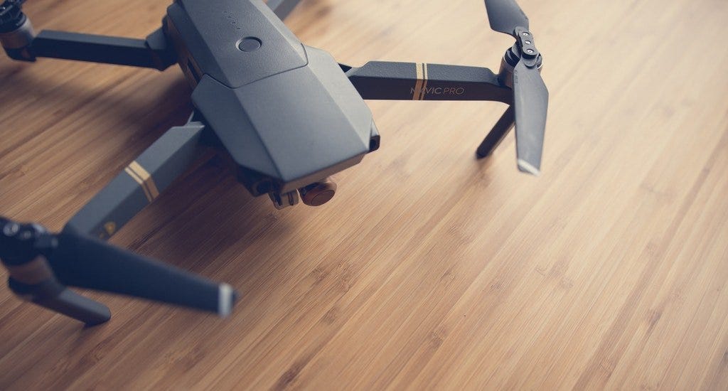 Drone sitting on a wooden floor