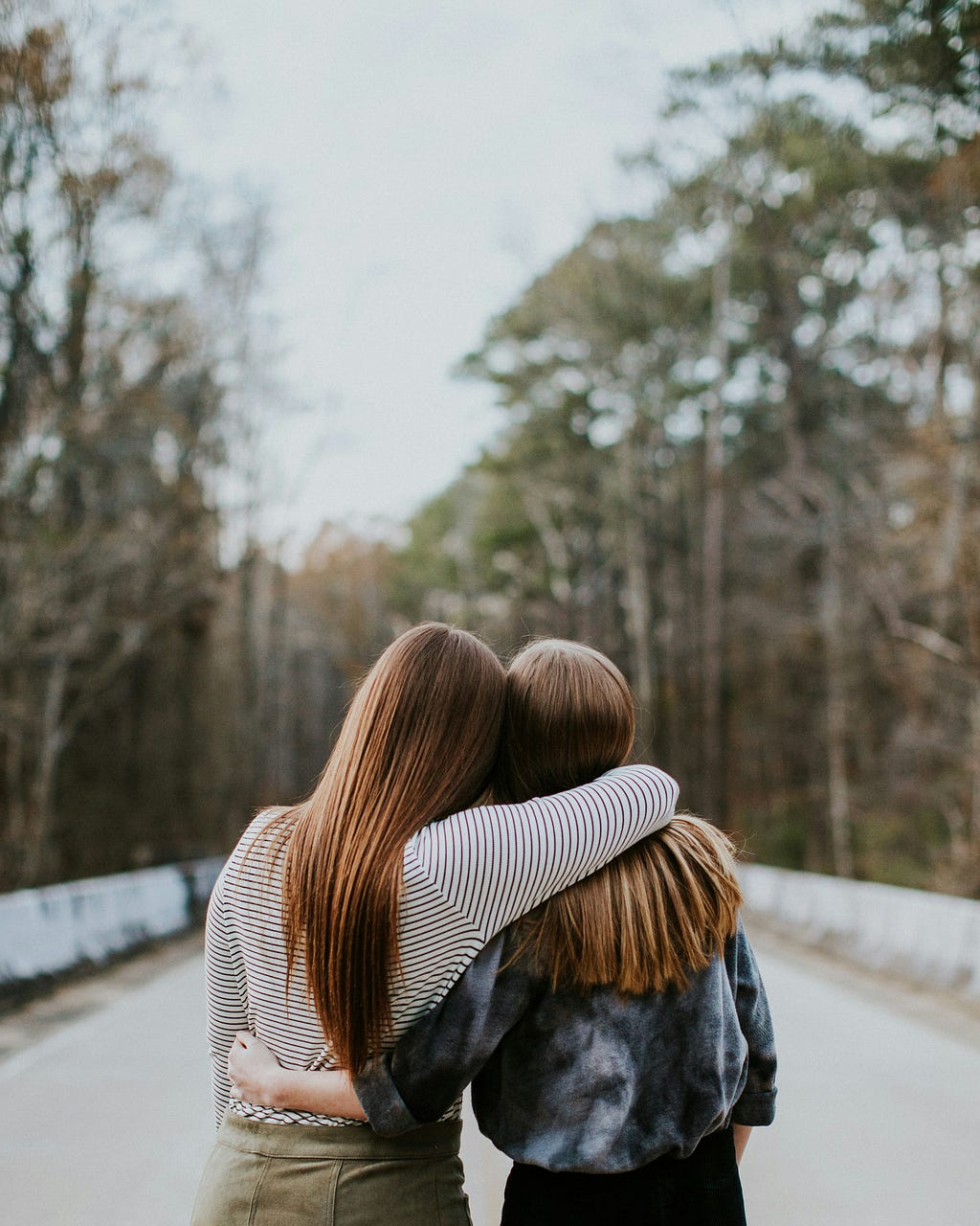 Two friends embracing