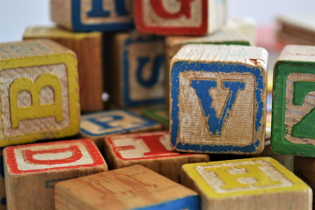 An image of wooden alphabet blocks.