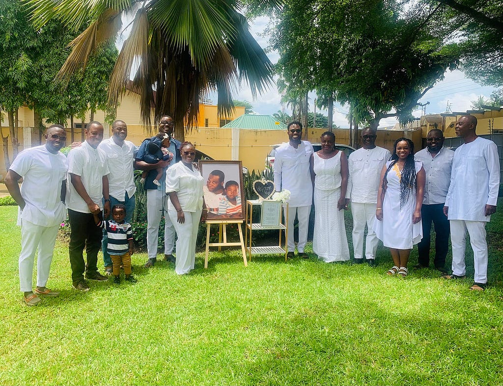 Emmanuel Francois Gamor and Emmanuel Agbeko Gamor (jr) framed picture with family and friends from around the world, Gamor residence at Airport West