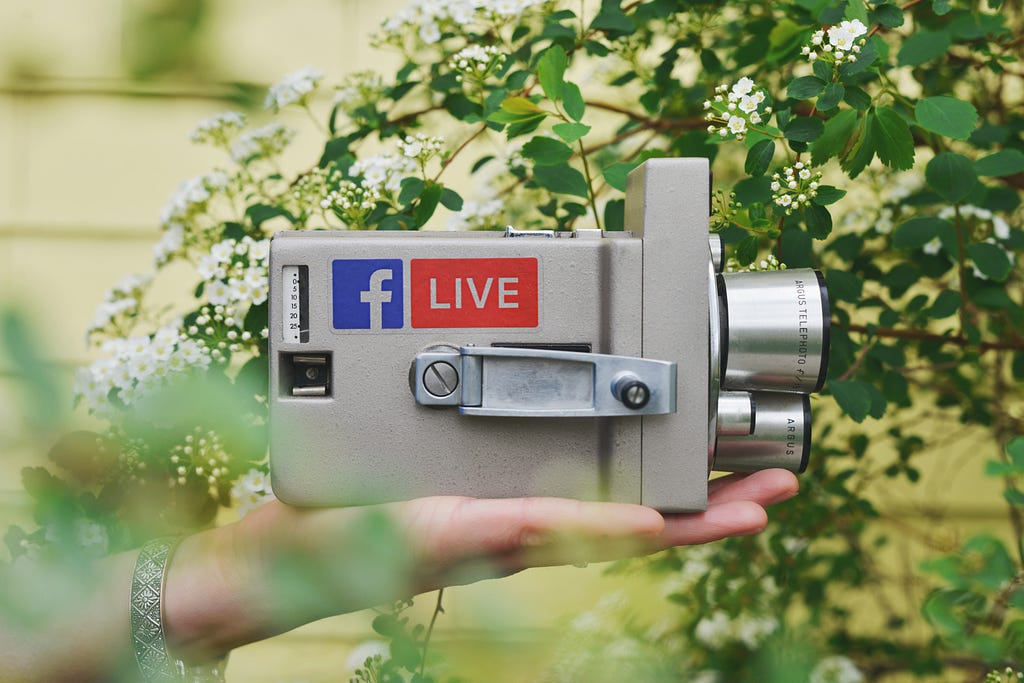 a photo of a video camera implying a live recording