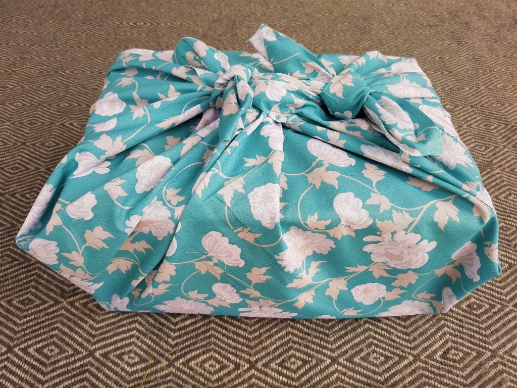 Turquoise floral wrapping for a large box