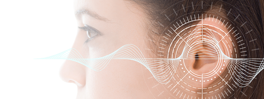Side profile of a person, the drawing of sine waves overlaid over their nose, cheek and ears. There are drawings of concentric circles emanating from their ear, signaling some sort of audio amplification.