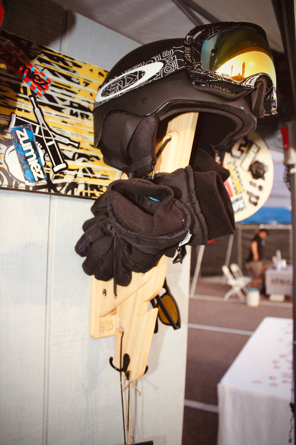 The Strax Rack storing and displaying ski helmet, goggles, and gloves.