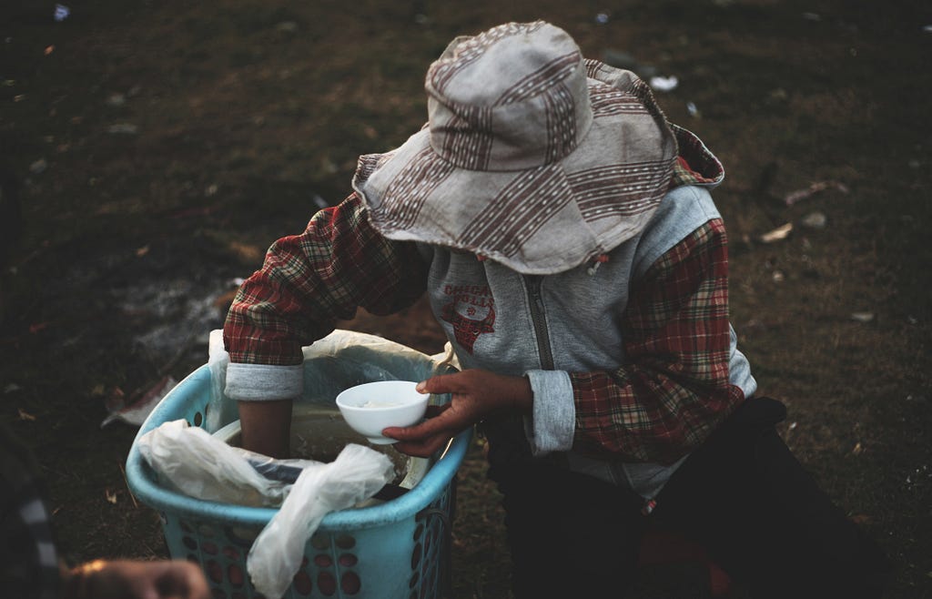 Women picking rice in third world country