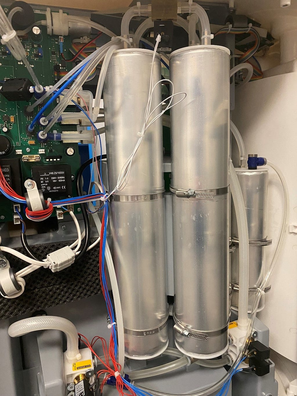 An image of the internal components of a prototype OxyLink 10 oxygen concentrator.