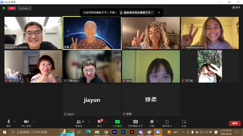 A screenshot from our online workshop. There were ten participants. One of them was clapping, and four others posing with a peace sign. This was a group photo at the end of the speech, and everyone was smiling happily.