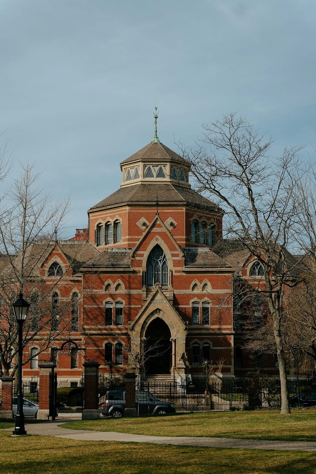 A large red brick building with a clock tower. Robinson Hall. Brown University